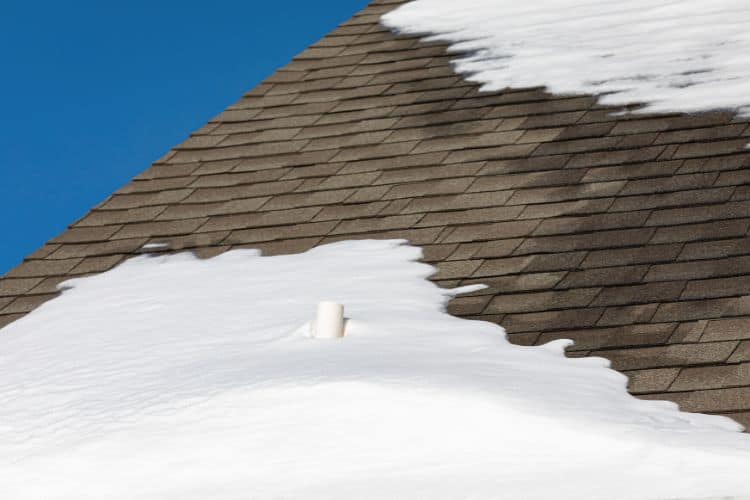 plumbing vent stack surrounded by snow