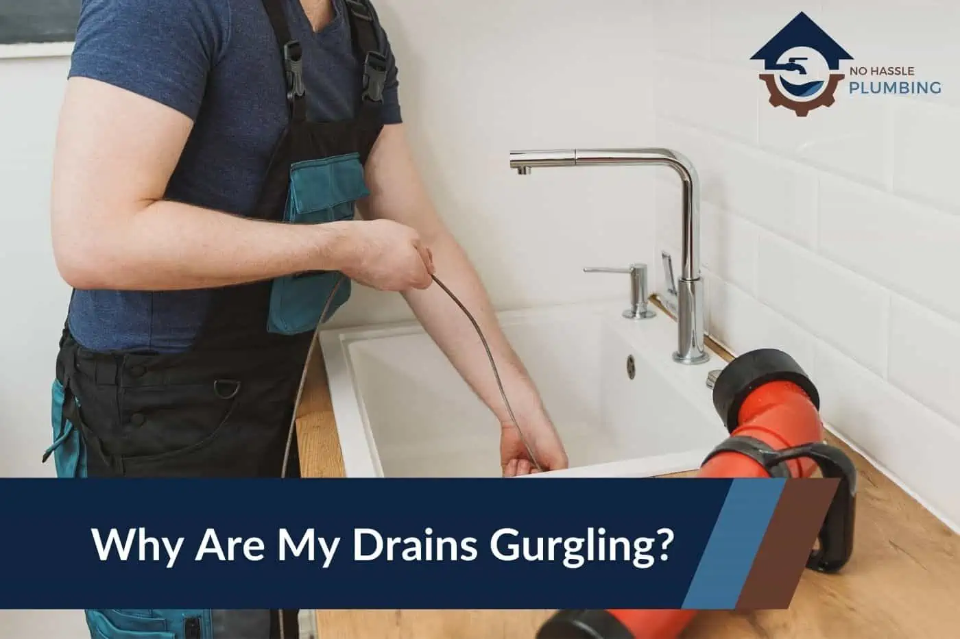 Why Are My Sink Drains Gurgling - no hassle plumbing Featured Image. showing plumber using plumbing snake on kitchen sink drain